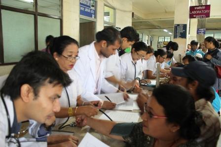 Final year students and Nursing staff busy in Health Camp